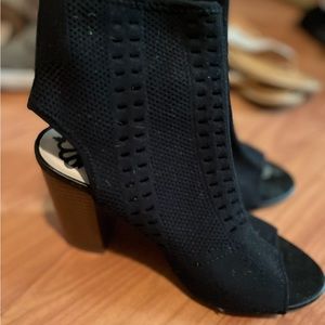 black ankle height shoes